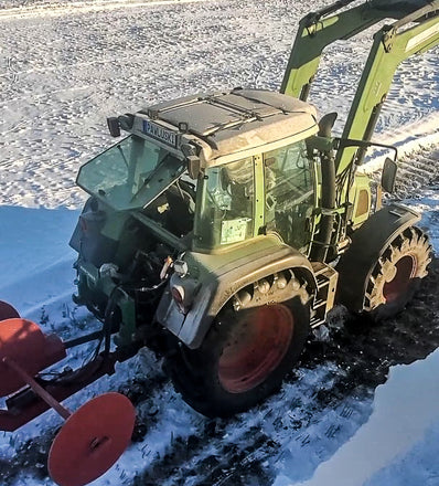 A tractor in the winter